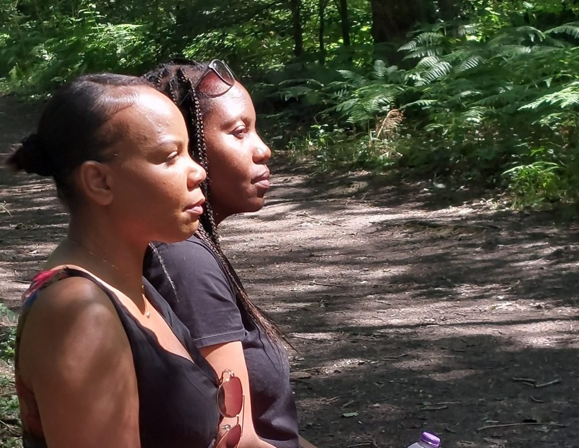 Two women reconnecting in nature